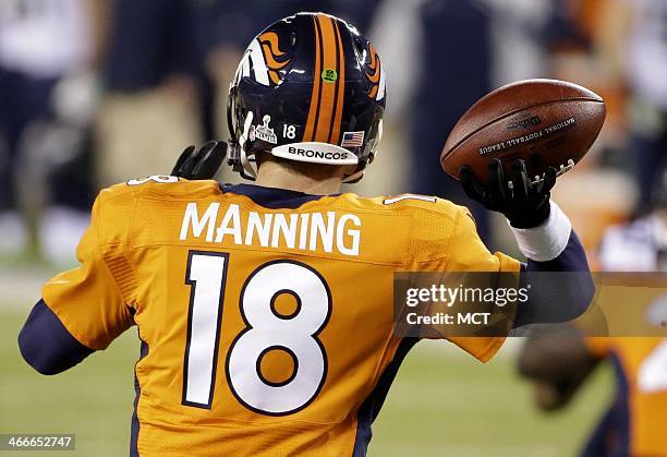 Peyton Manning of the Denver Broncos throws a pass against the Seattle Seahawks during the second half of Super Bowl XLVIII at MetLife Stadium in...