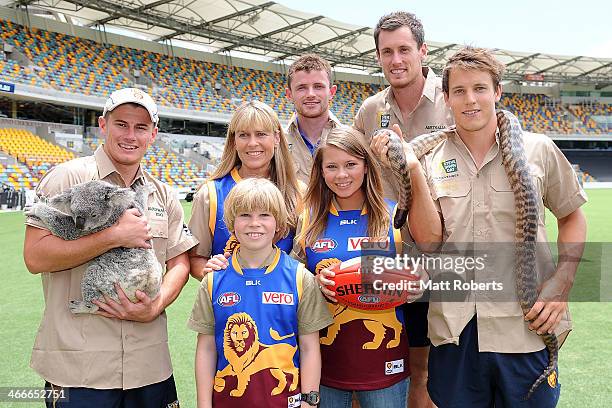 Lions players Dayne Zorko, Pearce Hanley, Matthew Leuenberger and Zac O'Brien pose for a photo with Terri, Robert and Bindi Irwin during a Brisbane...
