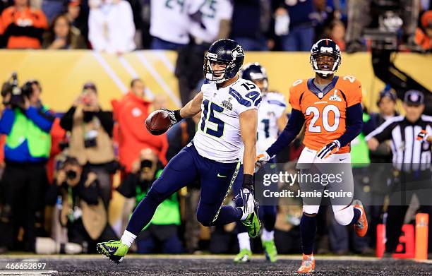 Wide receiver Jermaine Kearse of the Seattle Seahawks scores a 23 yard touchdown during Super Bowl XLVIII against the Denver Broncos at MetLife...