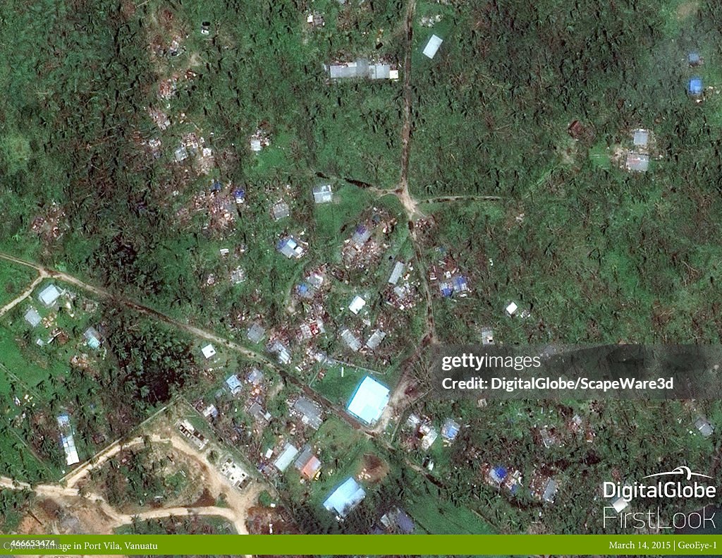 This is DigitalGlobe satellite imagery after Cyclone Pam hit a suburb outside of the capitalof Port Vila.