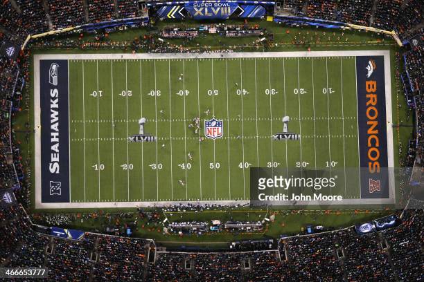 The Seattle Seahawks and the Denver Broncos play in the second half of Super Bowl XLVIII on February 2, 2014 in East Rutherford, New Jersey. The...