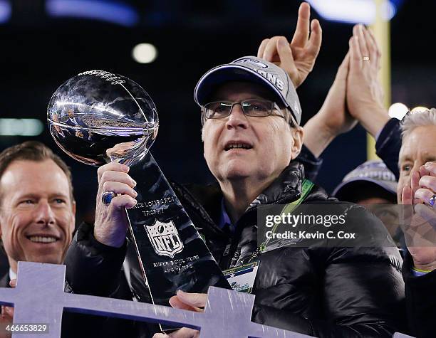 Team owner Paul Allen of the Seattle Seahawks celebrates with the Vince Lombardi trophy after defeating the Denver Broncos 43-8 in Super Bowl XLVIII...