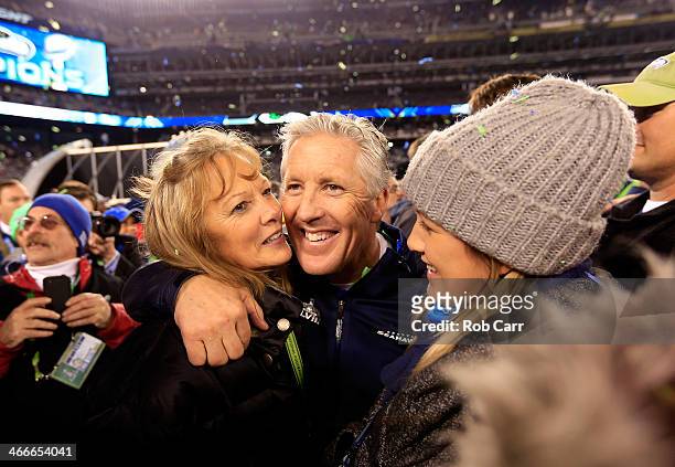 Head coach Pete Carroll of the Seattle Seahawks celebrates with his wife Glena after their 43-8 victory over the Denver Broncos during Super Bowl...