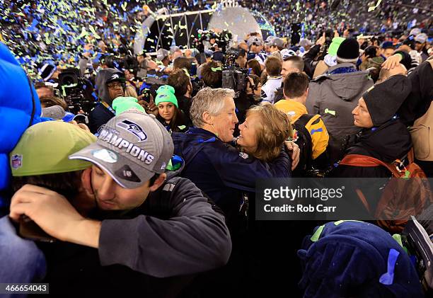 Head coach Pete Carroll of the Seattle Seahawks celebrates with his wife Glena after their 43-8 victory over the Denver Broncos during Super Bowl...