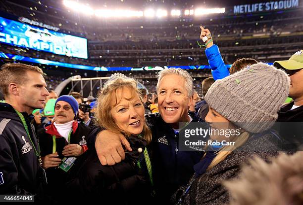 Head coach Pete Carroll of the Seattle Seahawks celebrates with his wife Glena after their 43-8 victory over the Denver Broncos during Super Bowl...