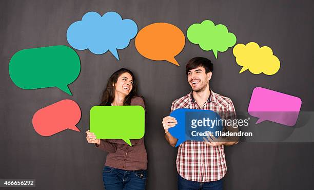 social netwroking - holding speech bubble stock pictures, royalty-free photos & images