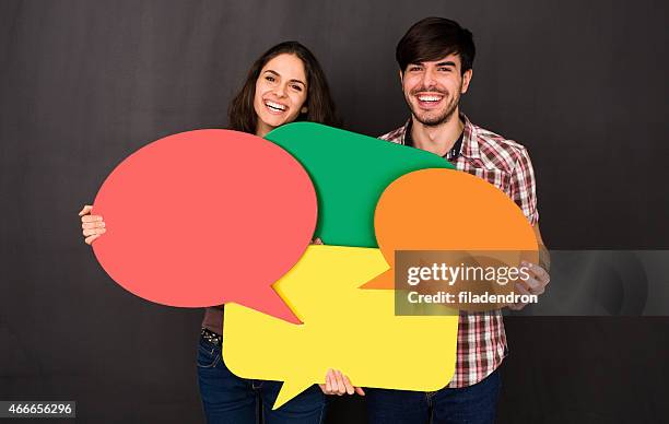 social netwroking - holding speech bubble stock pictures, royalty-free photos & images