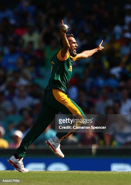 Imran Tahir of South Africa celebrates catching out Lahiru Thirimanne of Sri Lanka off his own delivery during the 2015 ICC Cricket World Cup match...