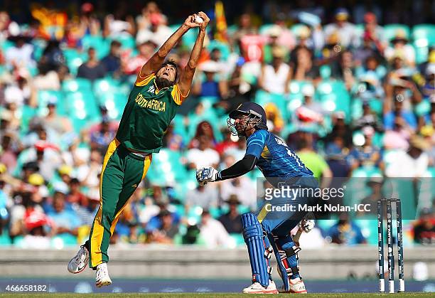 Muhammad Imran Tahir of South Africa takes a catch off his own bowling to dimiss Lahiru Thirimanna of Sri Lanka during the 2015 ICC Cricket World Cup...