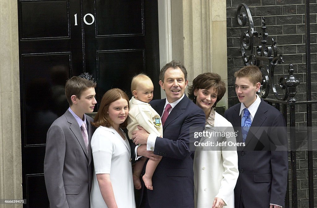 Prime Minister Tony Blair poses with his youngest son Leo, wife... News
