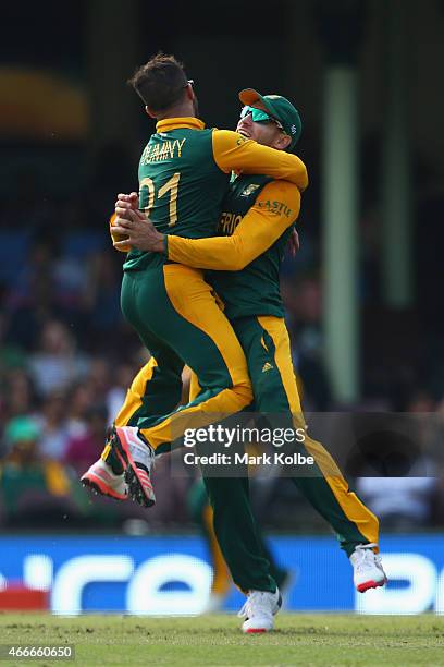 Duminy and Faf du Plessis of South Africa celebrates combining to take the wicket of Angelo Mathews of Sri Lanka during the 2015 ICC Cricket World...