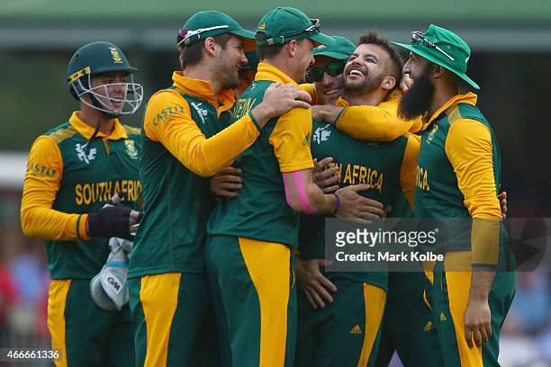 Duminy of South Africa celebrates with his team mates after taking the wicket of Tharindu Kaushal of Sri Lanka during the 2015 ICC Cricket World Cup...