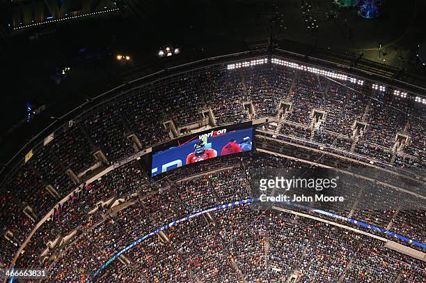 Denver Broncos quarterback Peyton Manning appears on a jumbotron while playing the Seattle Seahawks in Super Bowl XLVIII at MetLife Stadium on...