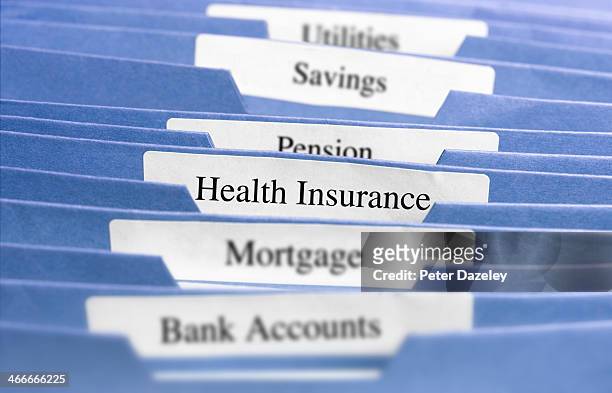 hanging files/health insurance - hanging file stock pictures, royalty-free photos & images