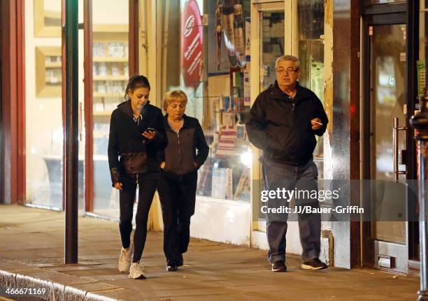 Mila Kunis with her parents Elvira Kunis and Mark Kunis are seen on May 20, 2013 in London, United Kingdom.