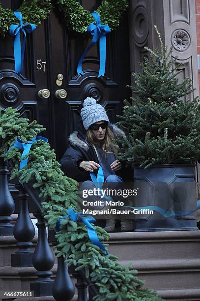 Sarah Jessica Parker is seen putting Christmas decorations on her house on December 19, 2012 in New York City.