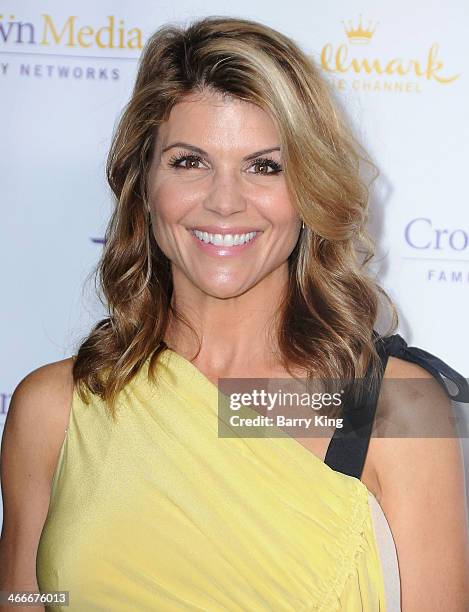 Actress Lori Loughlin arrives at the Hallmark Channel & Hallmark Movie Channel 2014 Winter TCA Party on January 11, 2014 at The Huntington Library...