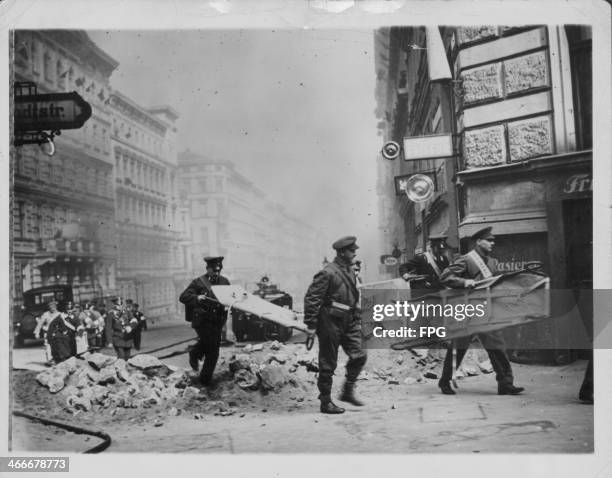Air raid practice in Berlin during World War Two, the damages from previous allied air raids can be seen all around, Germany, circa 1939-1945.