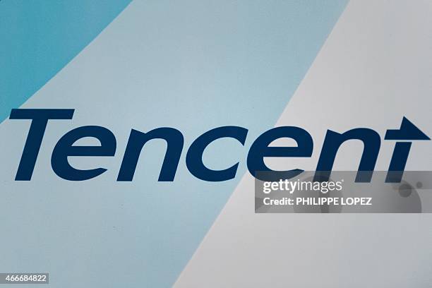 Logo of China Internet giant Tencent Holdings is seen during the announcement of the company's fourth-quarter results in Hong Kong on March 18, 2015....