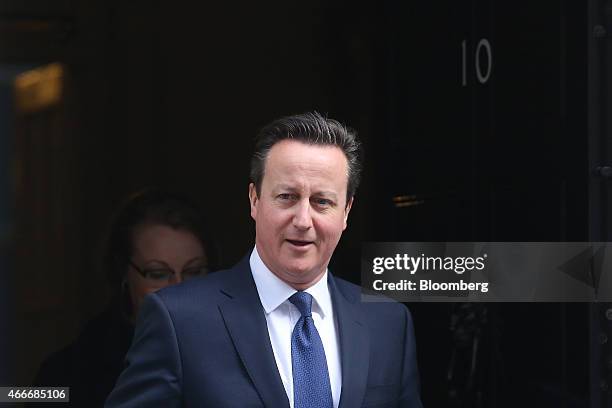 David Cameron, U.K. Prime minister, leaves 10 Downing Street following a pre-budget cabinet meeting in London, U.K., on Wednesday, March 18, 2015....