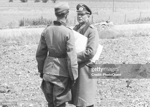 German General Heinz Guderian conferring with staff on the road, Le Quitteur, France, June 16, 1940.