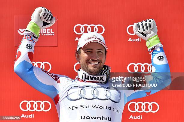 France's Guillermo Fayed celebrates after taking third place of the Men's downhill of the FIS Alpine Skiing World Cup in Meribel on March 18, 2015....