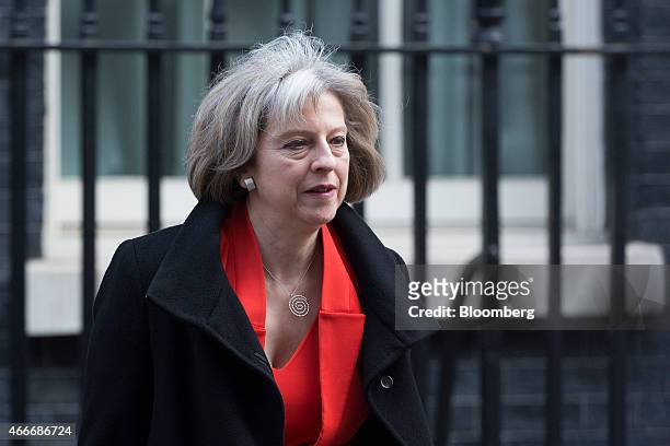 Theresa May, U.K. Home secretary, arrives at 10 Downing Street for a pre-budget cabinet meeting in London, U.K., on Wednesday, March 18, 2015. While...