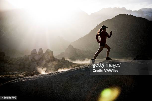 female athlete running - ultramarathon stock pictures, royalty-free photos & images