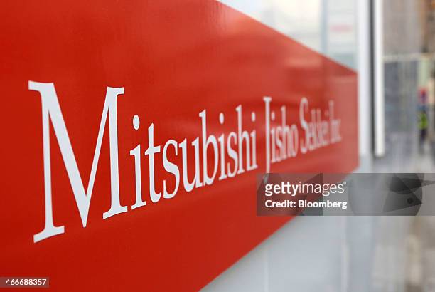 Logo of Mitsuibishi Jisho Sekkei Inc., a unit of Mitsubishi Estate Co., sits on display outside Mitsubishi Jisho Residence Co.'s Parkhouse Grand...