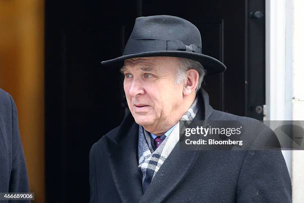 Vince Cable, U.K. Business secretary, leaves 10 Downing Street following a pre-budget cabinet meeting in London, U.K., on Wednesday, March 18, 2015....