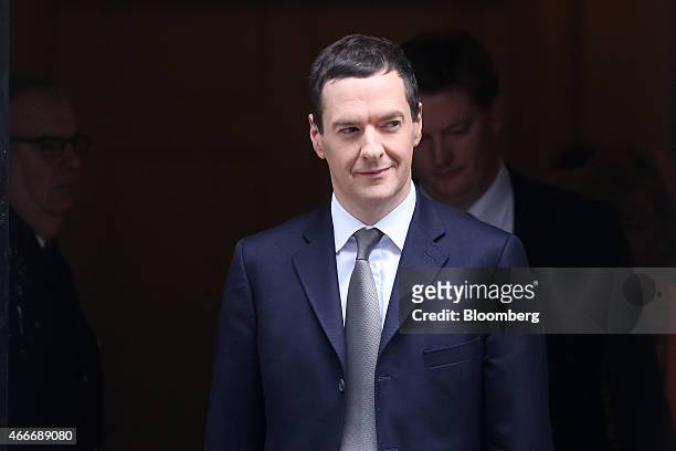George Osborne, U.K. Chancellor of the exchequer, leaves 11 Downing Street before posing for photographs with the dispatch box containing the 2015...