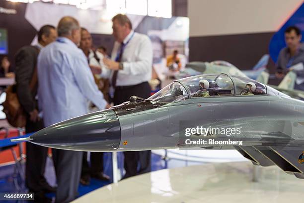 Model of the Mikoyan MiG-35 fighter jet stands on display during the Langkawi International Maritime And Aerospace Exhibition in Langkawi, Malaysia,...
