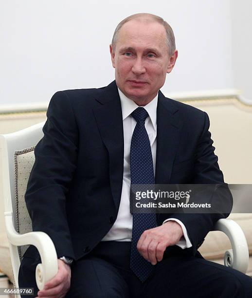 Russian President Vladimir Putin attends a meeting with President of South Ossetia Leonid Tibilov on March 18, 2015 in Moscow, Russia. A Lower House...