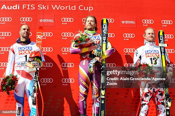 Kjetil Jansrud of Norway wins the race and the overall World Cup downhill globe, Didier Defago of Switzerland takes 2nd place, Georg Streitberger of...