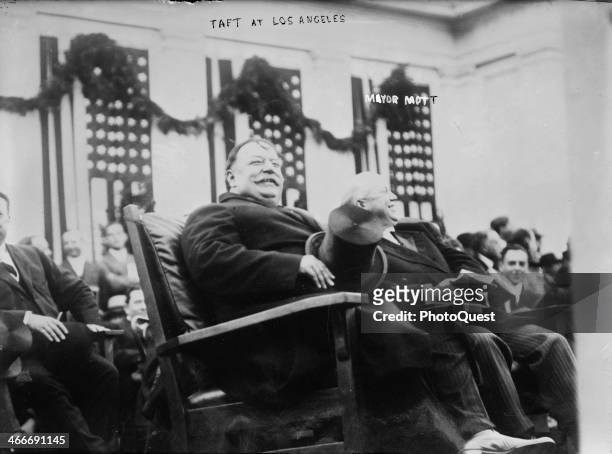 President William Howard Taft sits with Oakland Mayor Frank K. Mott during the former's campaign tour in southern California, and received a hearty...