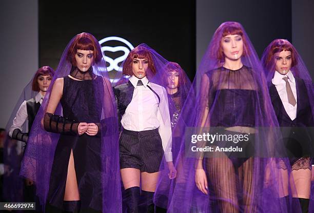 Models walk the runway at the Selma State show during Mercedes Benz Fashion Week Istanbul FW15 on March 18, 2015 in Istanbul, Turkey.