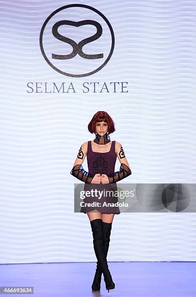 Model walks the runway at the Selma State show during Mercedes Benz Fashion Week Istanbul FW15 on March 18, 2015 in Istanbul, Turkey.