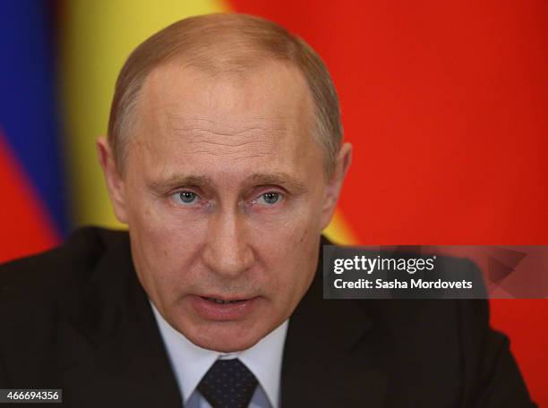 Russian President Vladimir Putin attends a meeting with President of South Ossetia Leonid Tibilov on March 18, 2015 in Moscow, Russia. A Lower House...