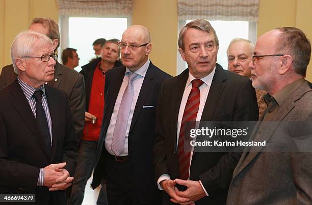 League President Dr.Reinhard Rauball and DFB President Wolfgang Niersbach attend a media event as the DFB and League Council hand over donations to...