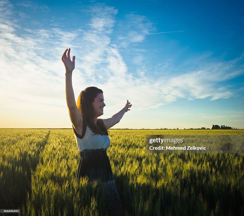 Happy woman in countryside