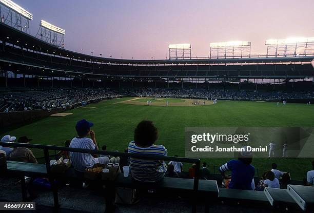 General view of Wrigley Field as the Chicago Cubs take batting practice for the first time during a night game at Wrigley Field on August 8, 1988 in...