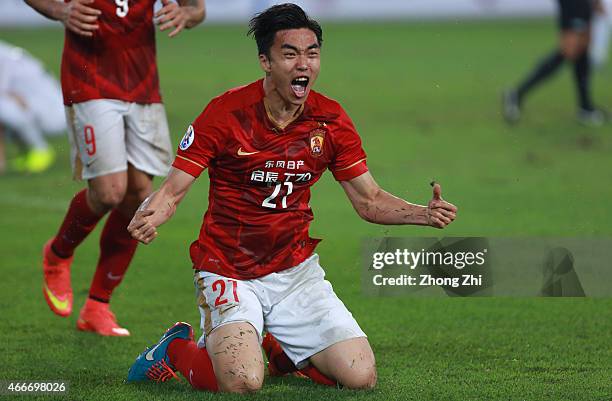 Zhao Xiaori of Guangzhou Evergrande celebrates the goal with teammates during the AFC Asian Champions League Group H match between Guangzhou...