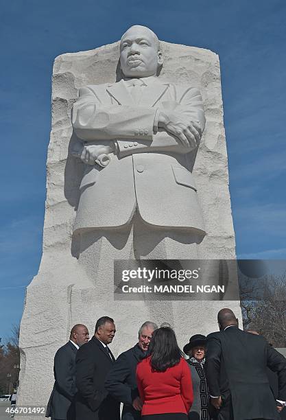 Britain's Prince Charles chats with civil rights leader Jesse Jackson , as he and his wife Camilla during a visit the Martin Luther King Memorial Jr....