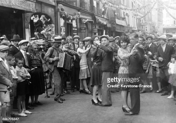 Ball in a street on July 14, 1929 in Paris, France.