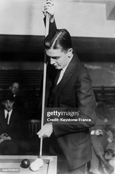 united-states-american-champion-ralph-greenleaf-is-playing-pool-on-a-plane-above-detroit-on.jpg