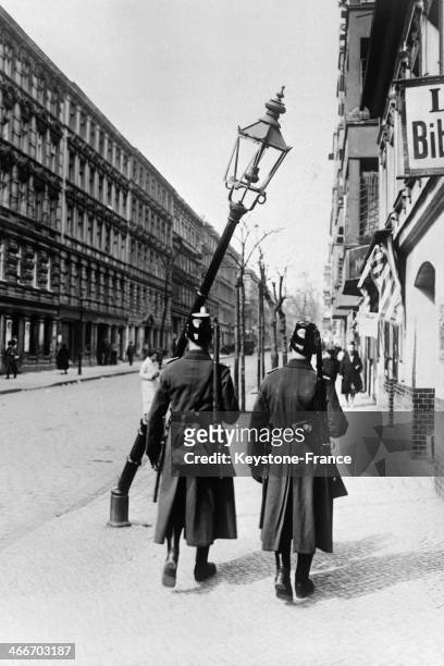 Policemen in the street after demonstration during 1st May parade on May 1, 1929 in Berlin, Germany.