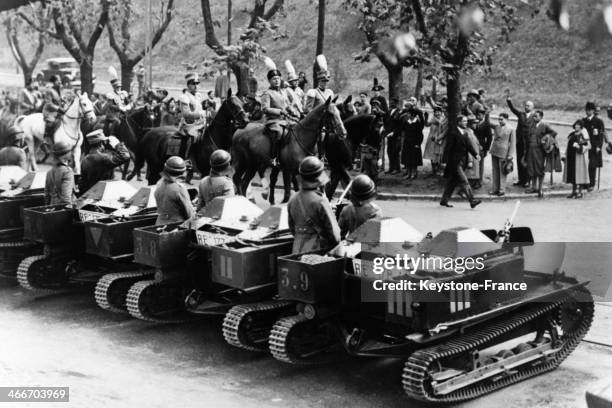 Benito Mussolini rides past a light tank company on horseback during Armistice Day celebrations on November 14, 1931 in Rome, Italy.