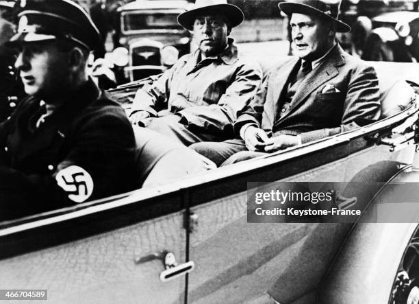 Hermann Goering, right, presiding officer of the Reichstag and Gregor Strasser, Reich Organization leader, leaving the Reichstag after its...