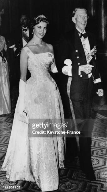Princess Margaretha of Sweden, escorted by Prince Wilhelm, arrive at the State Banquet in honour of Queen Wilhelmina and Prince Bernhard of The...