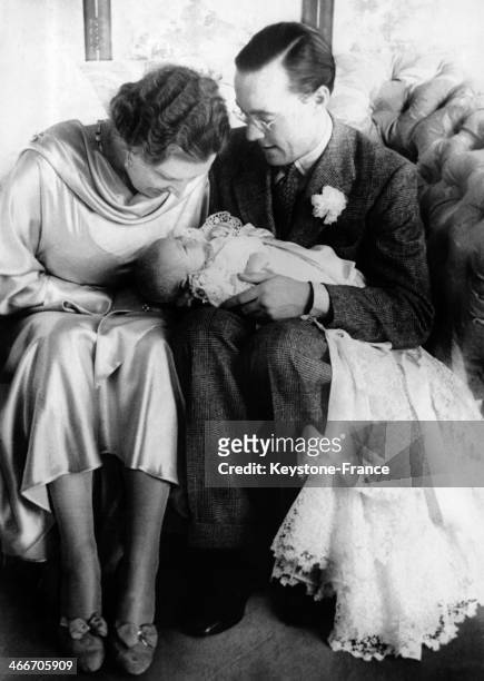 Princess Juliana and Prince Bernhard with their baby daughter, Princess Beatrix, at Soestdijk Palace on February 21, 1938 in Baarn, Netherlands.